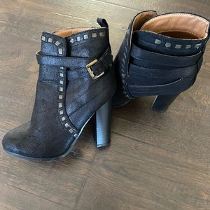 Black studded suede booties.